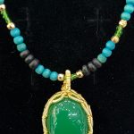 Handcrafted African Beaded Necklace with Green Gemstone Pendant