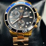 Tissot Seastar Chronograph Men's Watch – Gold Stainless Steel, Black Dial, Blue Bezel, Swiss Quartz